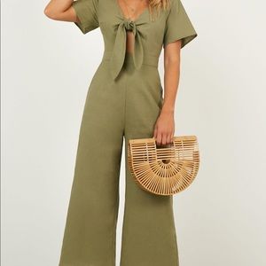 The thing about her jumpsuit.